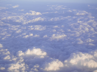 Fototapeta na wymiar many cloud in blue sky , air plane window view