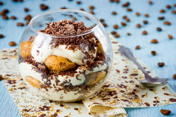 Traditional Italian dessert tiramisu in glass
