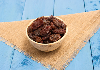 the raisins on a blue board