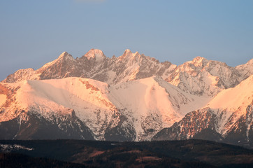 Fototapeta na wymiar Morning panorama of snowy Tatra mountains