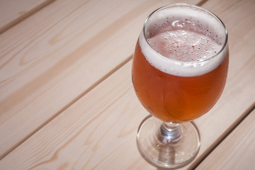 Amber ale on wood