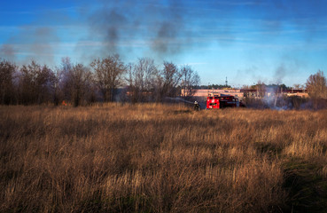 fire truck to put out a forest fire. firefighters to extinguish