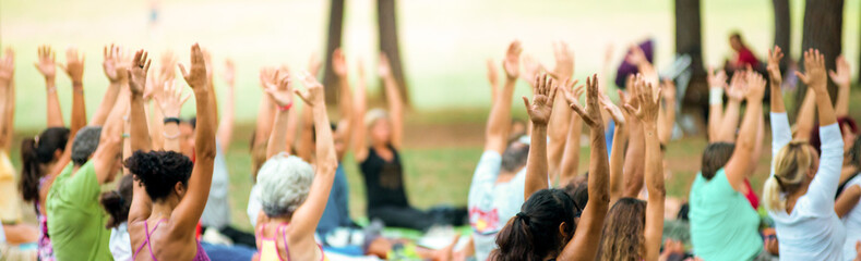 banner of hands up of people doing yoga
