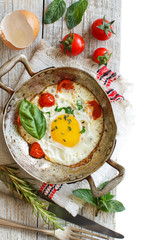 Fried egg on an old frying pan