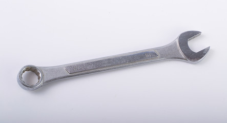 Close up of dirty spanner isolated on white, with clipping path