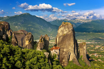 Greece. Meteora - incredible sandstone rock formations rise from the ground and the monasteries on...