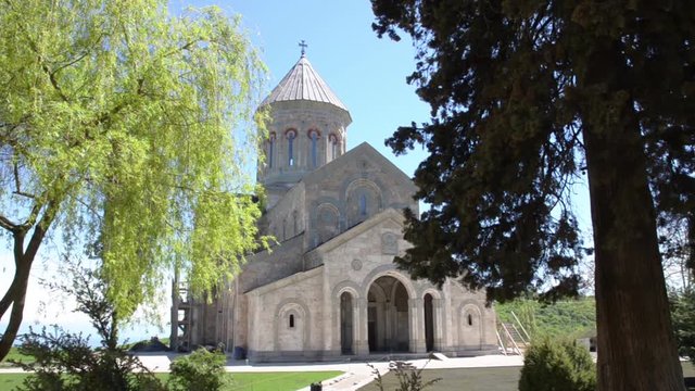 Monastery of St. Nino in Bodbe surrounded by trees, spring
