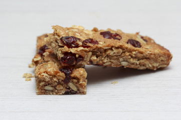 Mueslibar on white wooden background