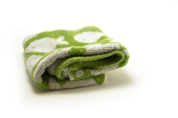 green towel isolate on white 

