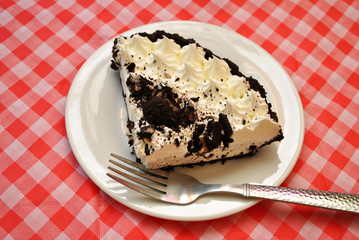 Whipped Cream Cookie Pie Served on a White Plate