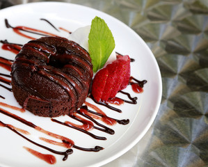 Gourmet chocolate desert on fancy decorated plate