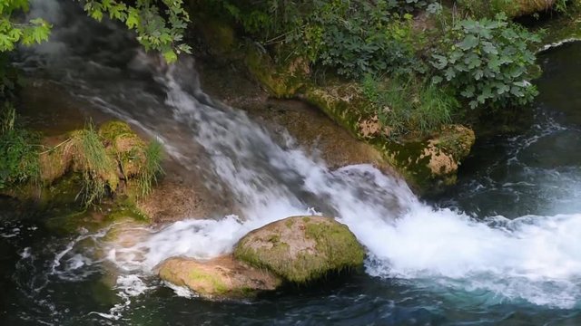 River flowing on rock with sound.