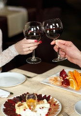 Couple toasting wineglasses