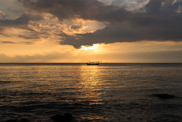 Fototapeta na wymiar Sunset and ocean view on paradise beach Negara - Bali Island, In