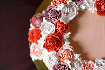 Birthday cake with red roses.