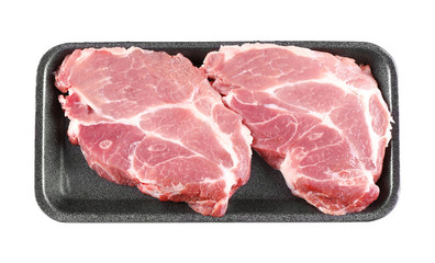 Packed pieces of pork meat, isolated on white