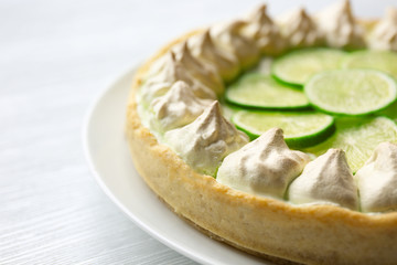 Lime cake on wooden background