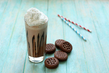 Fresh milk cocktail on wooden background