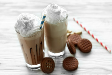 Fresh milk cocktail on wooden background