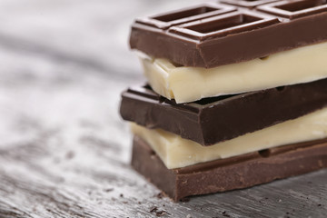 Mix of chocolate on wooden table