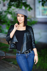 Beautiful girl in a leather jacket