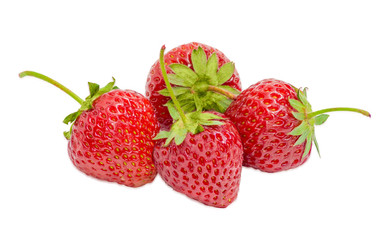 Fototapeta na wymiar Garden strawberry fruit closeup on a light background
