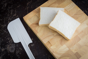 Bread on wooden background