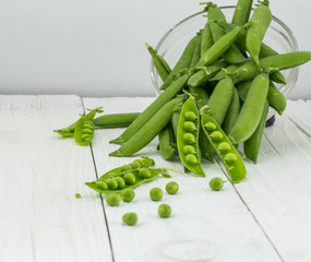 pile of green peas, white background