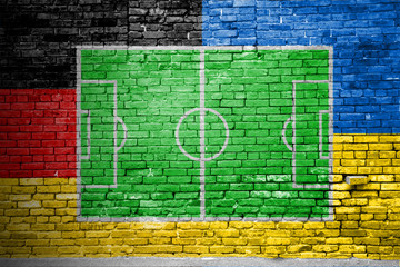 Ziegelsteinmauer Deutschland vs. Ukraine Fußballfeld Graffiti