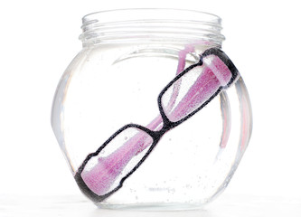 glasses and glass bowl with water