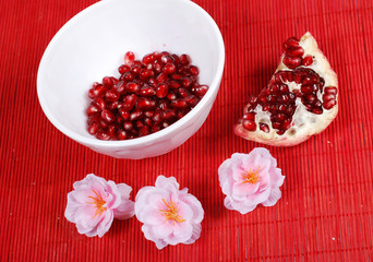 red seeds and white bowl