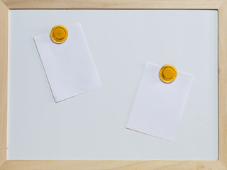 paper note with magnet on whiteboard. Blank paper and a blank area for text input