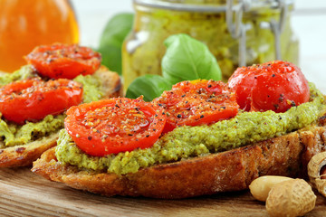 Fresh sandwich with pesto and tomato