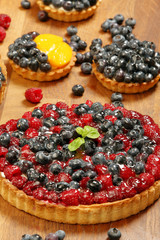 Fruit tart dessert on wooden table