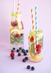 The cold refreshing lemonade with fresh berries
