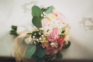 Wonderful luxury wedding bouquet of different flowers