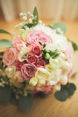 Wonderful luxury wedding bouquet of different flowers