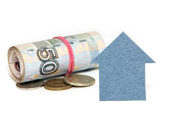 Cardboard houses and the Russian money on a white background. Bu