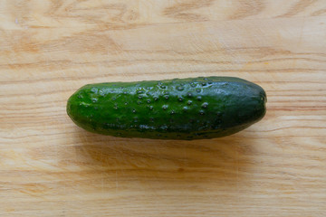 cucumber on wooden Board