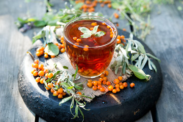 Healthy hot tea with a sea-buckthorn
