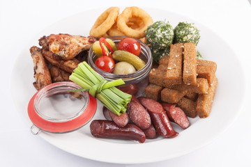 snacks to beer on plate