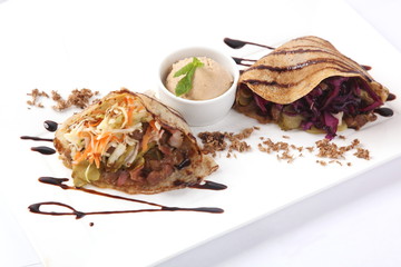 stuffed pancakes with sauce