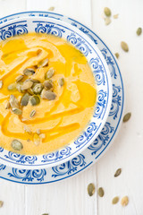 Pumpkin cream soup with sunflower seeds
