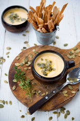 Pumpkin cream soup with sunflower seeds
