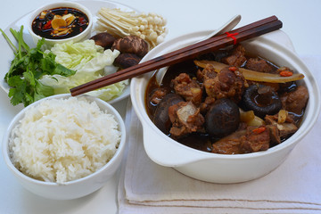 ba kut teh. Malaysian stew of pork and herbal soup,
