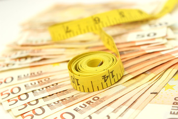 Measure tape and money