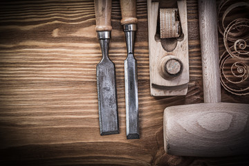 Lump hammer planer firmer chisels planning chips on vintage wood