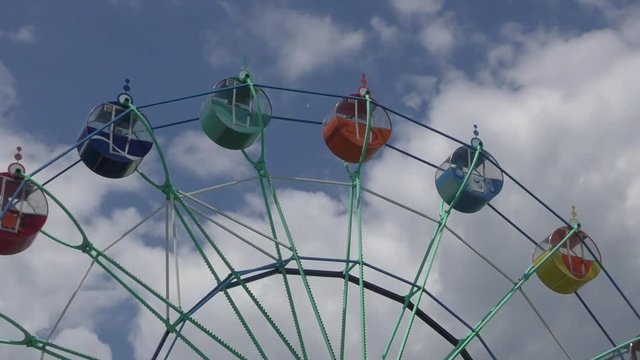 Ferris wheel in the summer Park