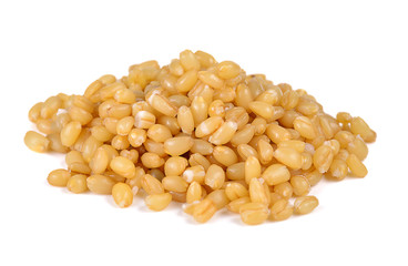 pile of pearl barley isolated on a white background.