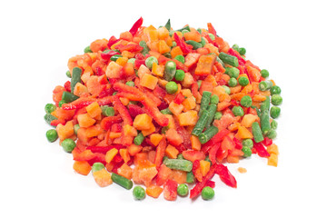 Pile of frozen vegetables isolated on white